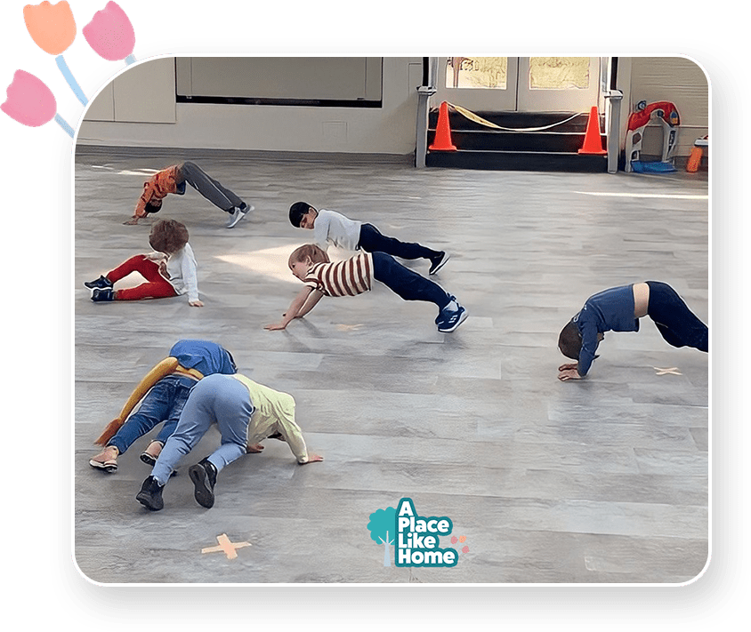 A group of children doing various activities on the floor.